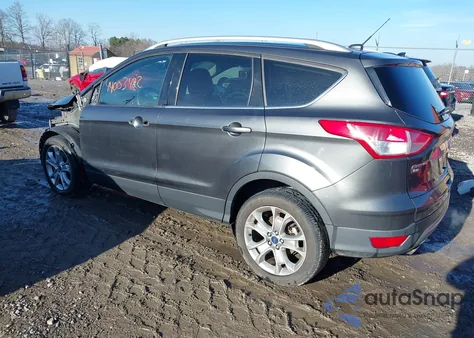 2015 Ford Escape Titanium z USA, uszkodzony, nr VIN 1FMCU9J91FUC02880